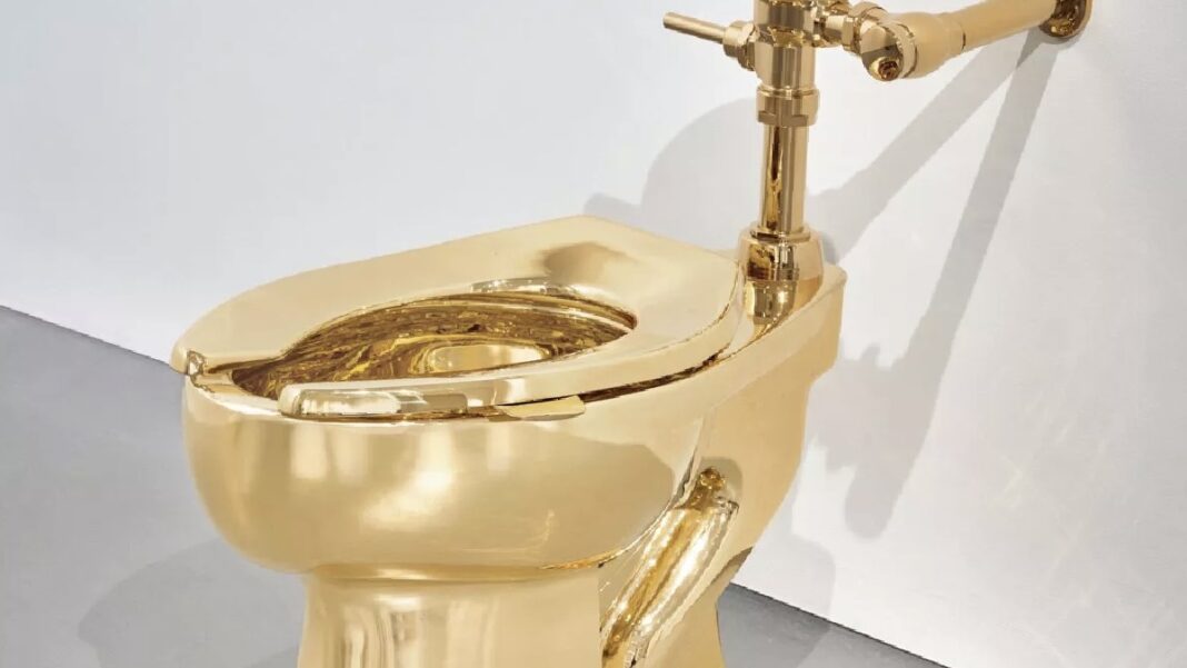 Golden toilet sells for millions