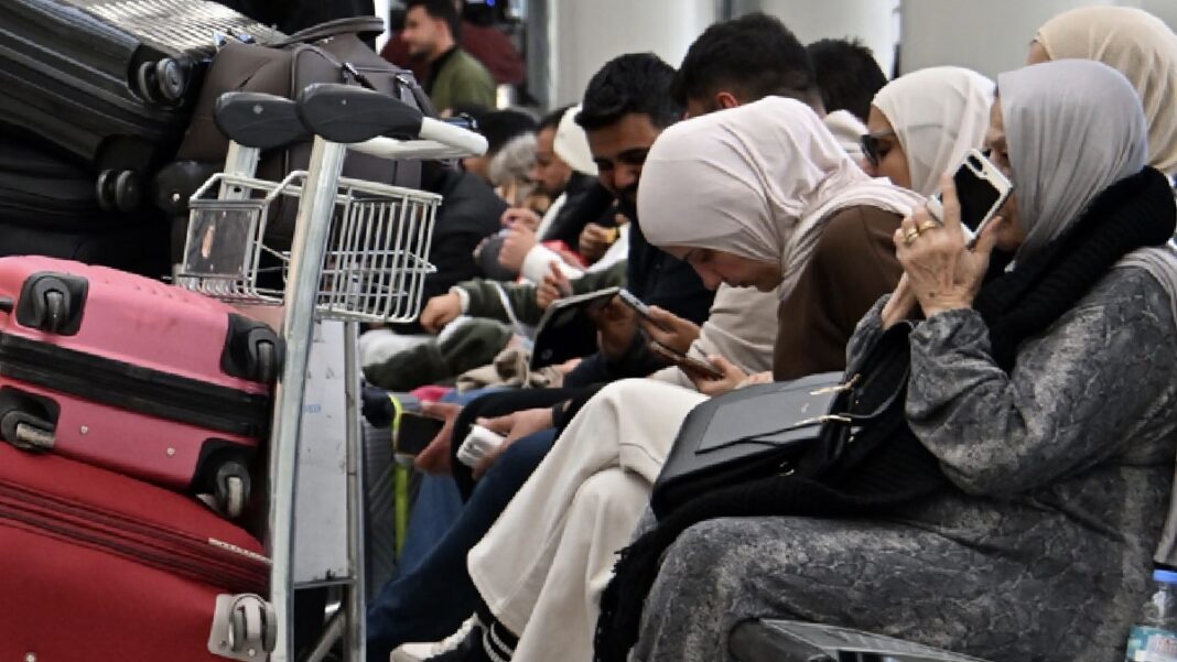 Stranded travelers scramble to make new connections as war shuts much of Middle East to air travel